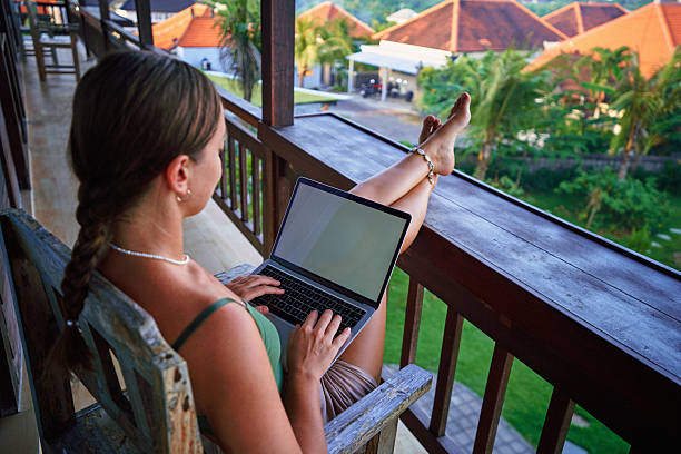 istock Mockup. Modern smart girl freelancer with blank computer screen for smart working and browsing online in a cozy place. Digital nomad people, empty advertising space, copy space 2206795540