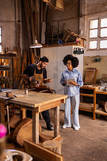 istock Team Collaboration in a Sustainable Wood Workshop 2206795667