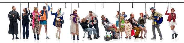 istock Collage. People in dynamic interaction, some standing, others sitting, reflecting contrasts of urban society through expressions and outfits inside public transport. 2206802881