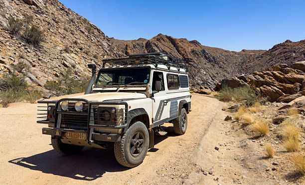 AUGRABIES, South Africa - November 16, 2024: Old Land Rover Defender parked on a dirt road