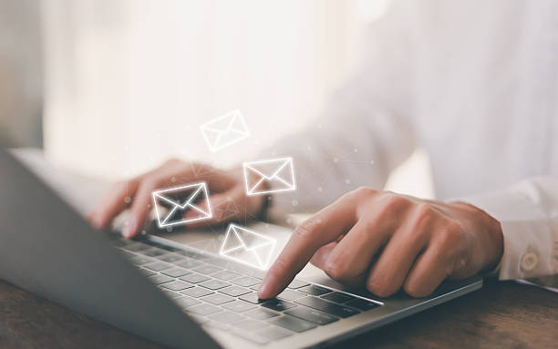 istock New email notification concept, business online communication, email communication, digital marketing, businessman responding to floating digital interface showing new email notification symbol. 2206807408