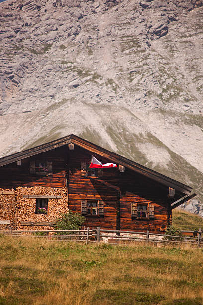 Dolomites with wooden chalets, Trentino Alto Adige, South Tyrol, Italy, Europe