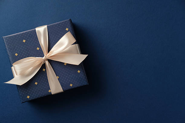 istock Happy Fathers Day gift box on navy blue background. Flat lay, top view. 2206815829