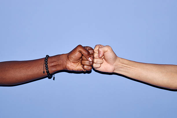 istock Celebrating Unity with Multiracial Fist Bump 2206816517