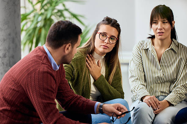 istock Support Group Gathering with Individuals Sharing Their Personal Thoughts and Emotions 2206817636