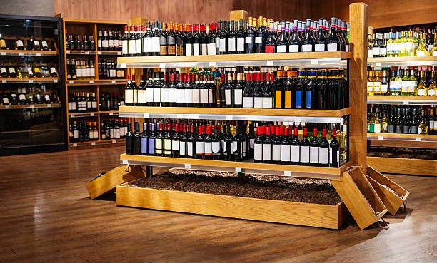 istock Wine bottles on retail display in liquor store 2206829938
