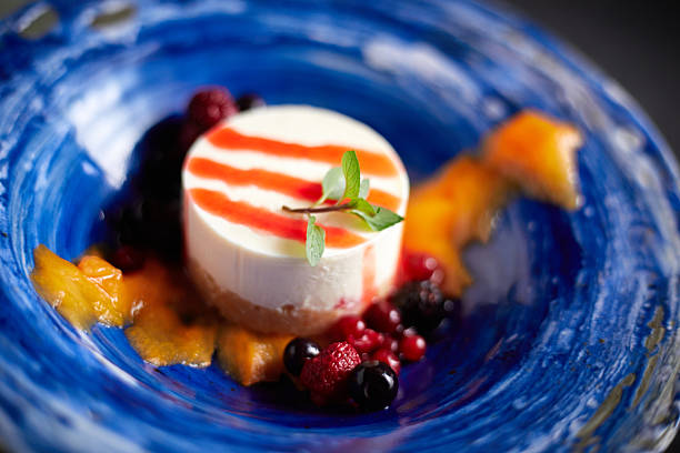 Close up Mix berry cheese cake ,Beautiful and tasty food on a plate, exquisite dish, creative restaurant meal concept