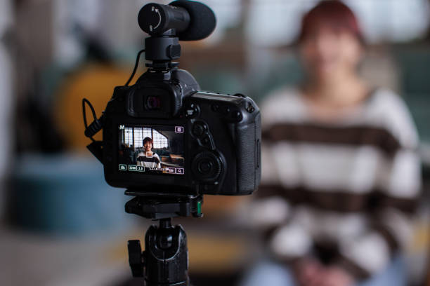 istock Teenage Girl on Camera Display While Recording Vlog 2206833109