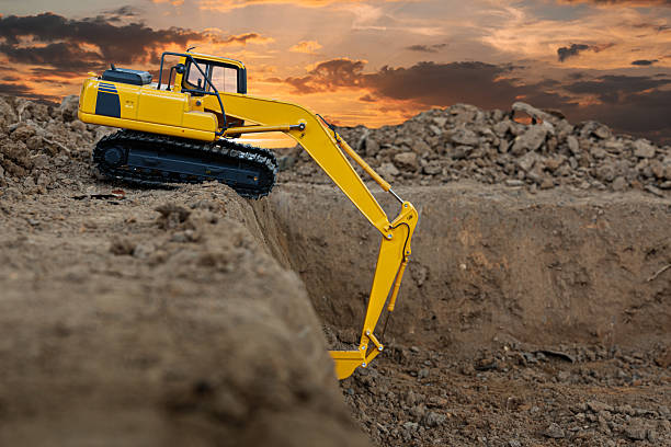 istock Excavators are digging the soil in the construction site . 2206840339