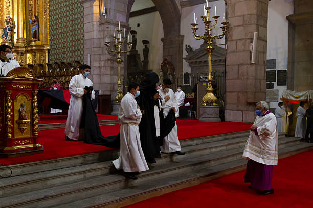 Senior priest in dark room
