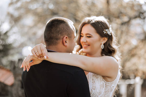 istock A man and woman are embracing each other 2206841234