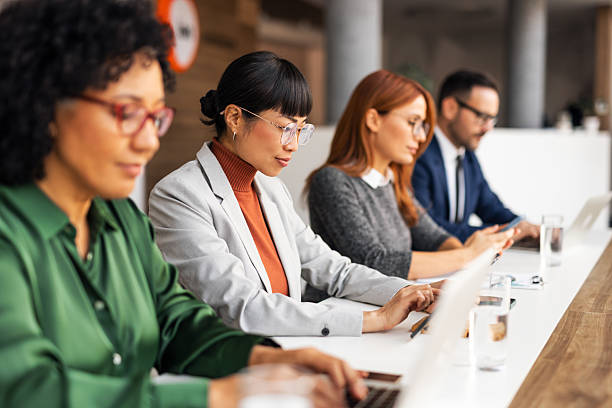 istock Focused Professionals Working Together in a Modern Office Setting 2206841388