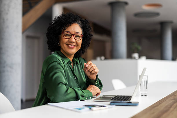 istock Confident Professional Woman in Modern Office Using Digital Technology 2206841511
