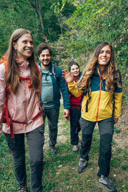 istock friends on the weekend doing a trekking 2206844546