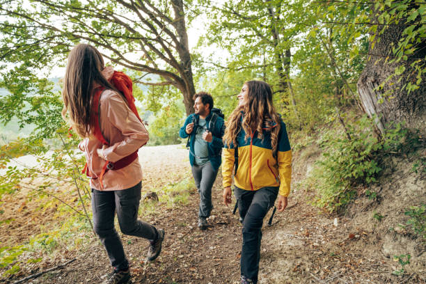 istock friends on the weekend doing a trekking 2206844686