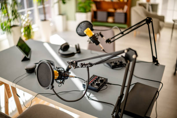 istock Engaging podcast studio setup with professional sound equipment and joyful atmosphere for creative discussions 2206845554