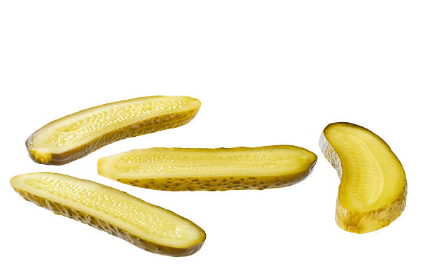 istock pickled cucumbers cut into strips isolated on a white background. 2206847684