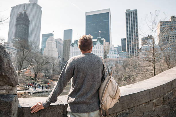 istock Man Enjoying City Skyline View from Park 2206847873
