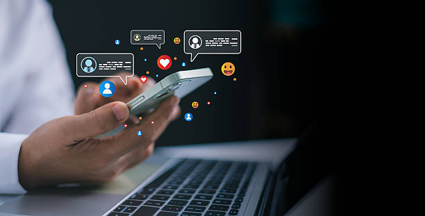 istock Connect with social media network via smartphone, Women hand using smartphone typing, Chatting conversation in chat box icons pop up, Social media marketing concept, Live Chat Chatting on application. 2206856074