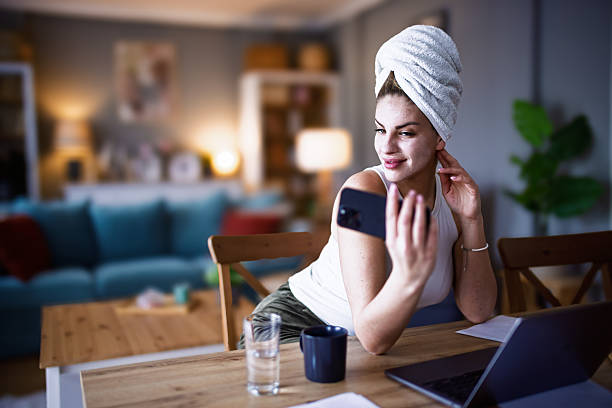 istock Female business person using digital tablet and laptop e-learning or remote working at home office, looking at digital tablet watching webinar, learning training, studying online seminar or video calling. 2206858180