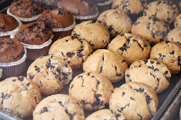 istock A display of incredibly delicious Chocolate Chip Muffins and Cupcakes 2206858526