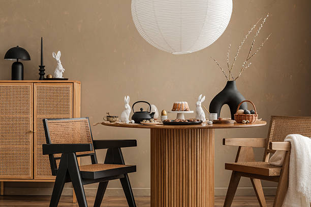 istock A modern Easter table with black and white contrasts, organic textures, and soft lighting. Tulips and festive elements create an inviting space that celebrates spring in style. 2206858681