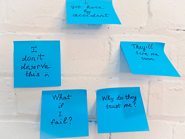 Imposter syndrome concept depicted with sticky notes of self-doubt and confusion.