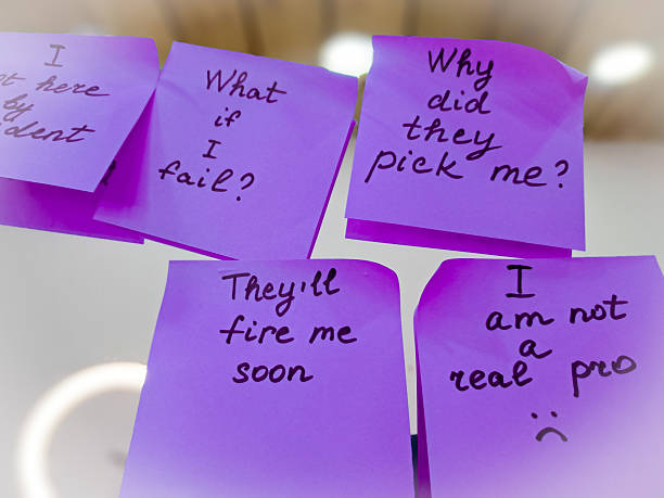 istock Imposter syndrome concept depicted with sticky notes of self-doubt and confusion. 2206859814