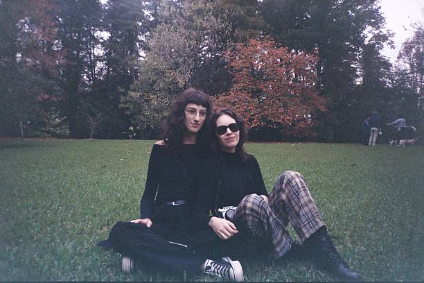 Lesbian couple in the park stock photo