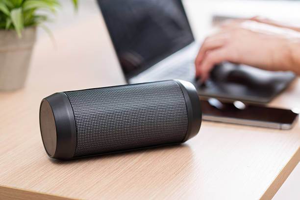 istock Business man enjoys his favorite tunes while scrolling through his smartphone 2206862122