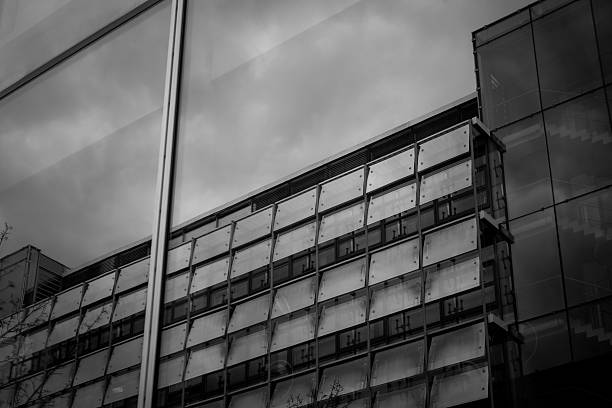 istock Reflection of modern architecture on a cloudy day in an urban environment 2206863049