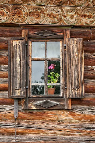 istock Rustic wooden window with antique shutters adds vintage charm 2206863958