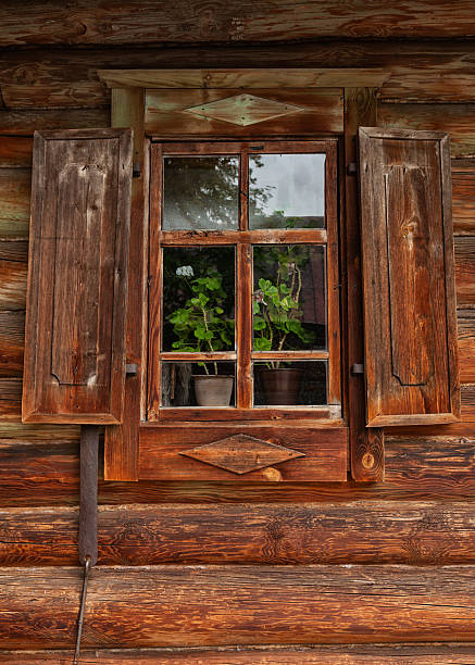 istock Rustic wooden window with antique shutters adds vintage charm 2206864013