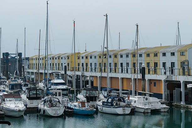 Tiny homes, house boats and Boats and Yachts moored in Brighton Marina on the south coast of England 23 March 2025 - Brighton, UK - Tiny homes, house boats and Boats and Yachts moored in Brighton Marina on the south coast of England small houseboats stock pictures, royalty-free photos & images