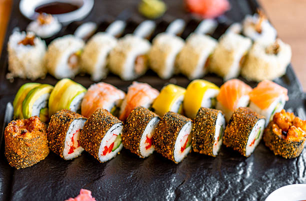 Delicious arrangement of fresh traditional Japanese sushi rolls