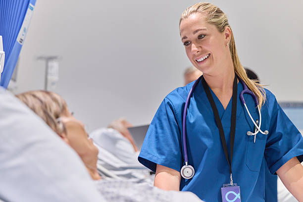 Smiling female doctor talking with patient