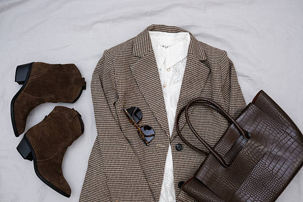 istock Chic and Stylish Fall Outfit Featuring a Brown Blazer Paired with Trendy Accessories 2206873033