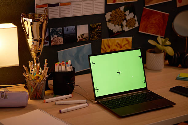 istock Organized Workspace Featuring Laptop and Stationery Items 2206880439