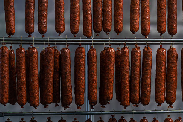 istock Hanging sausages drying in a traditional food curing space 2206881557