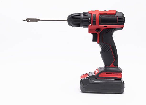 istock an electric cordless screwdriver with a drill bit. isolated on a white background. 2206881692
