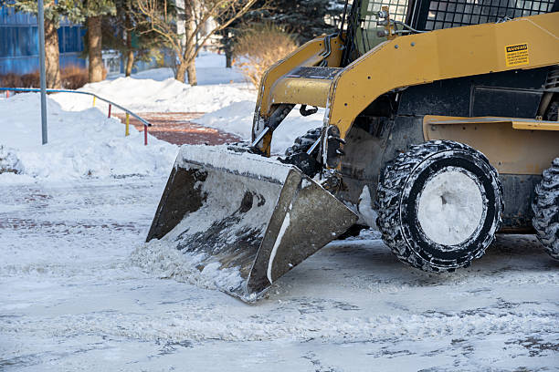 istock Snow Removal Equipment Effectively Operating on a Wintery Landscape During a Snowstorm 2206882487