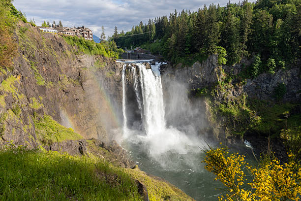 istock Snoqualmie Falls Washington State USA pacific northwest PNW Seattle waterfall rainbow. A majestic powerful intense flowing waterfall 2206883360