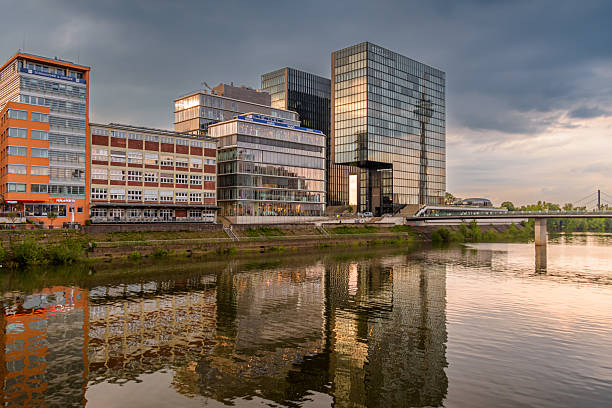 The Media Harbor (Medienhafen) Dusseldorf. Reflection of the rhine tower (Rheinturm) in a glass skyscarper