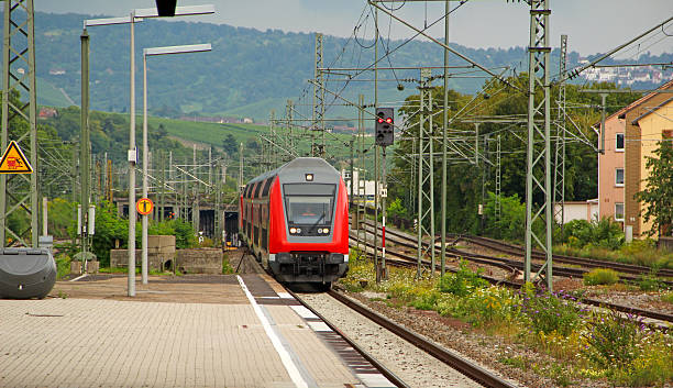 Red train in station at south germany city.