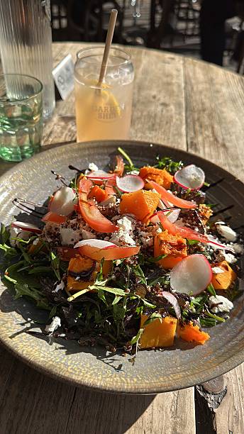 istock Delicious fresh salad with fruits and vegetables 2206888850