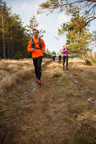 istock People cross country running 2206893502