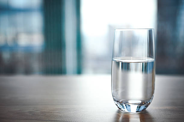 istock glass of clean water on the table 2206893779
