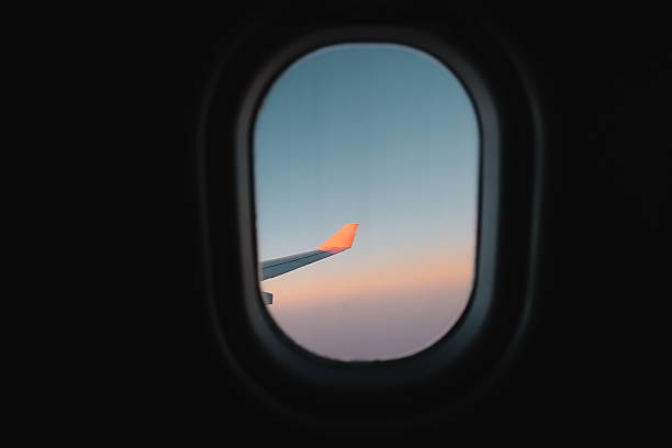 istock The breathtaking view from an airplane window at sunset showcasing a beautiful sky 2206895166
