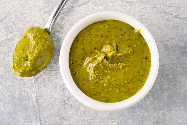 istock Delicious pistachio butter on white background 2206896309