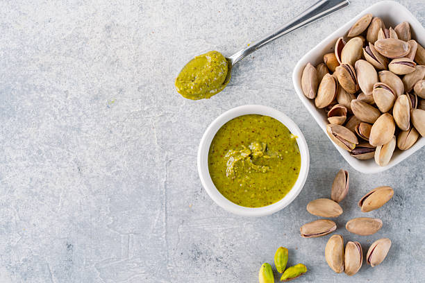 istock Delicious pistachio butter on white background 2206896412